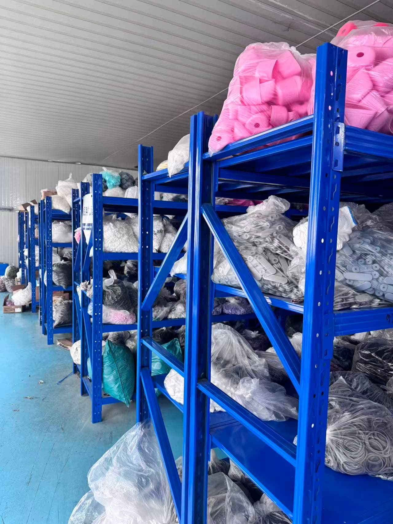 Factory warehouse shelves storing product components